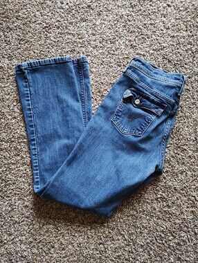 Levi's 515 Bootcut Stretch Medium Wash Cut Flap Pocket Detail